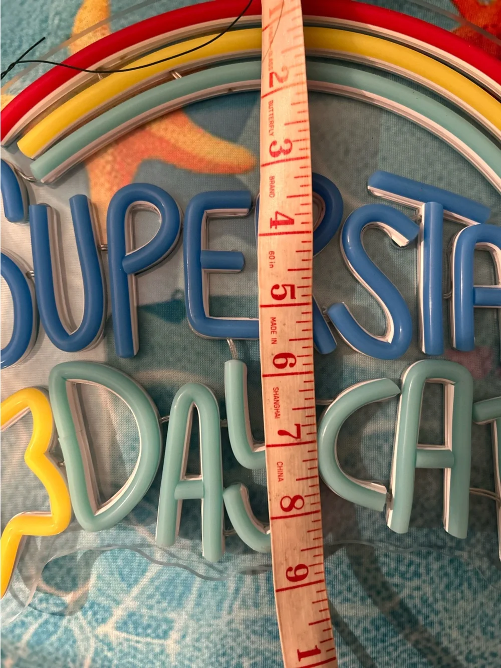 Neon 'Superstar Daycare' Sign - Blue, Teal, Yellow, Red